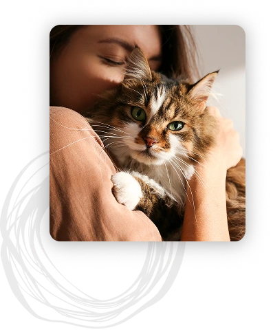 A woman hugging her cat
