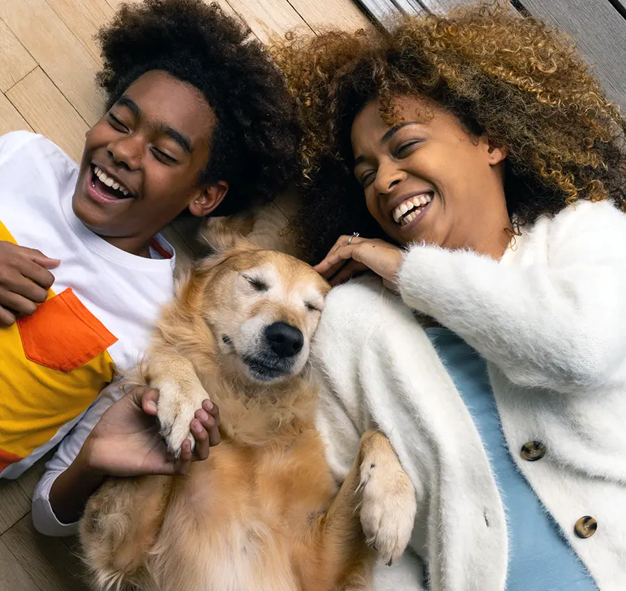 Two people and a dog